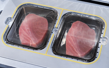 Tuna steaks being packaged using Modified Atmosphere Packaging (MAP)