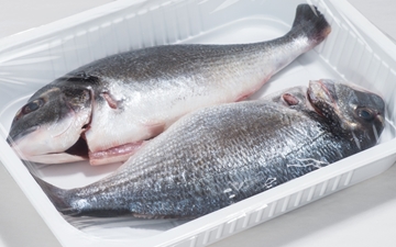 The product picture shows the packaging for fish. It was taken during a photoshoot in Spain.